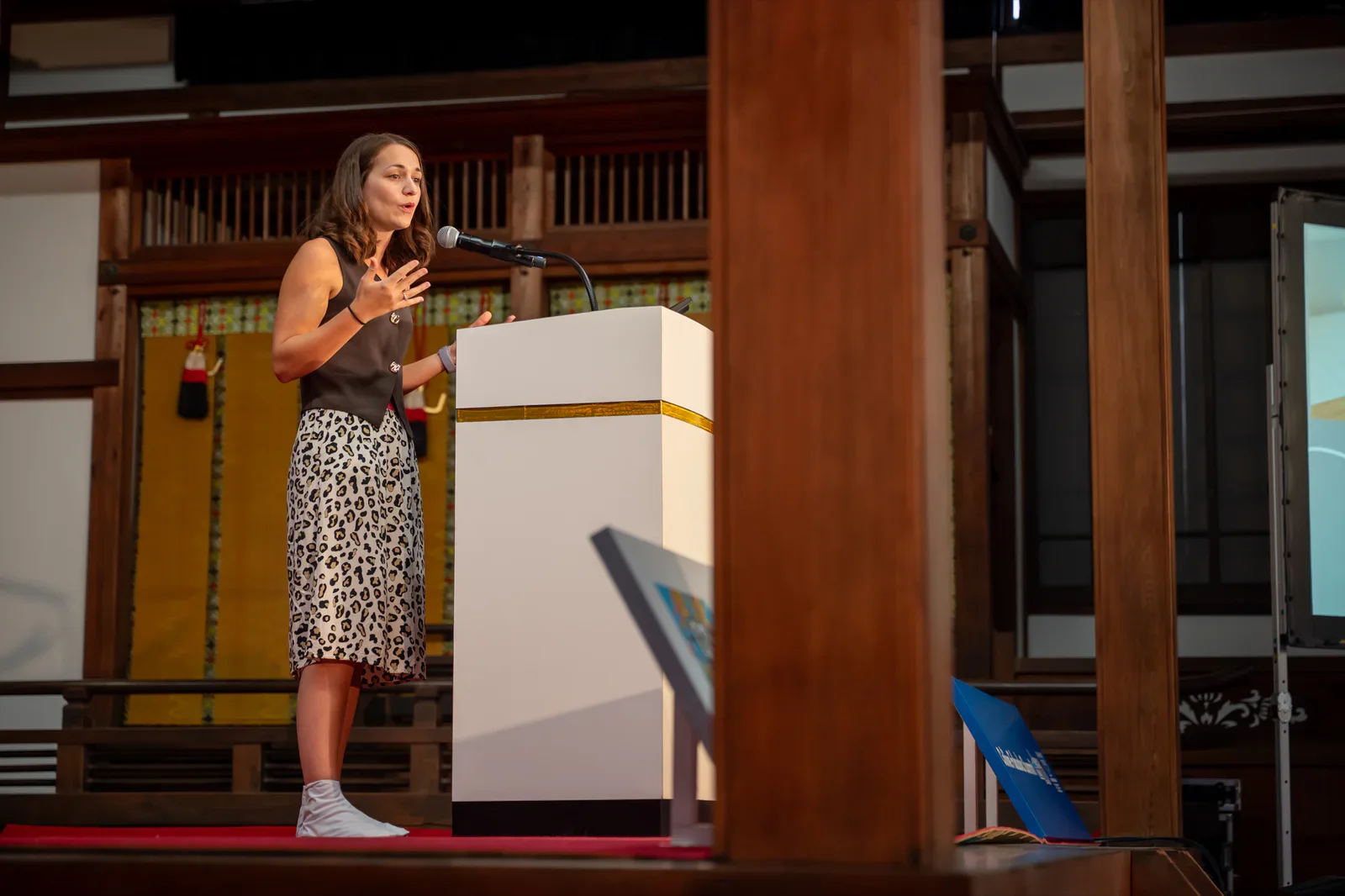 A speaker sharing her point of view at the Colive Fukuoka Summit